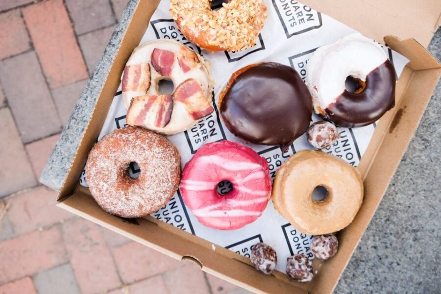 Boston: Guided Delicious Donut Tour with Tastings - Rose Kennedy Greenway and Quincy Market: moving through scenic breaks