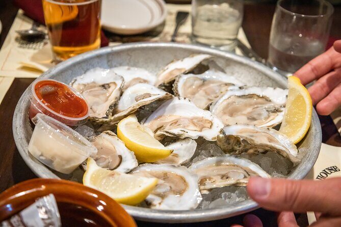Boston Seafood & Freedom Trail Walking Tour - Quincy Market and Faneuil Hall: food hall energy with Revolutionary anchors