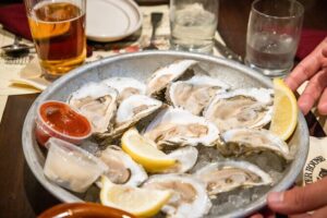 Boston Seafood Tour: Behind the Scenes at the Historic Fish Pier - The Harbor Story You Get: From Working Industry to Sustainability