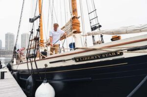 Boston: Sunset Tall Ship Harbor Cruise - Hoist the sails and steer: what the hands-on crew moments feel like